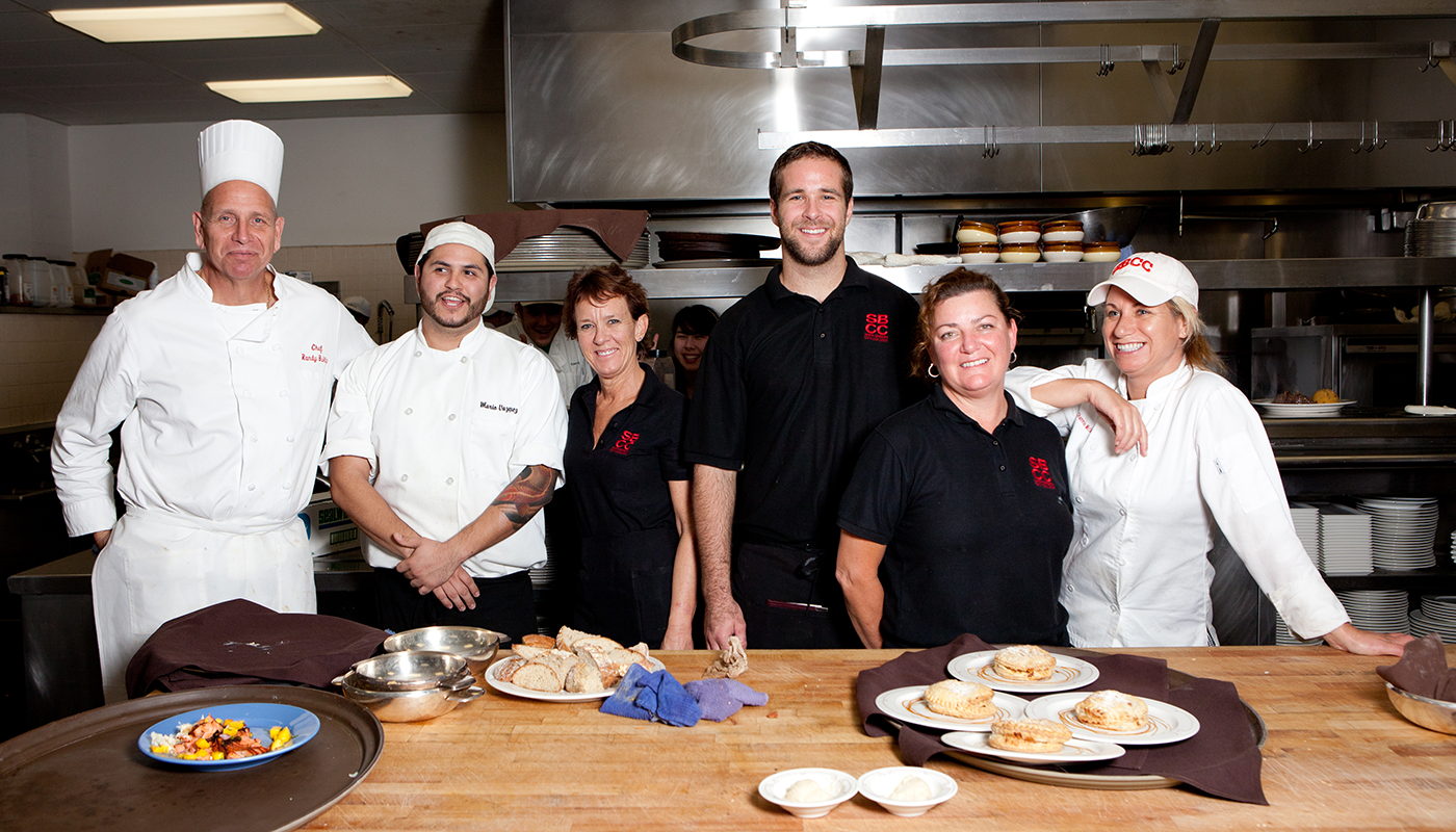 Santa Barbara City College Culinary Arts instructors pose in the kitchen.